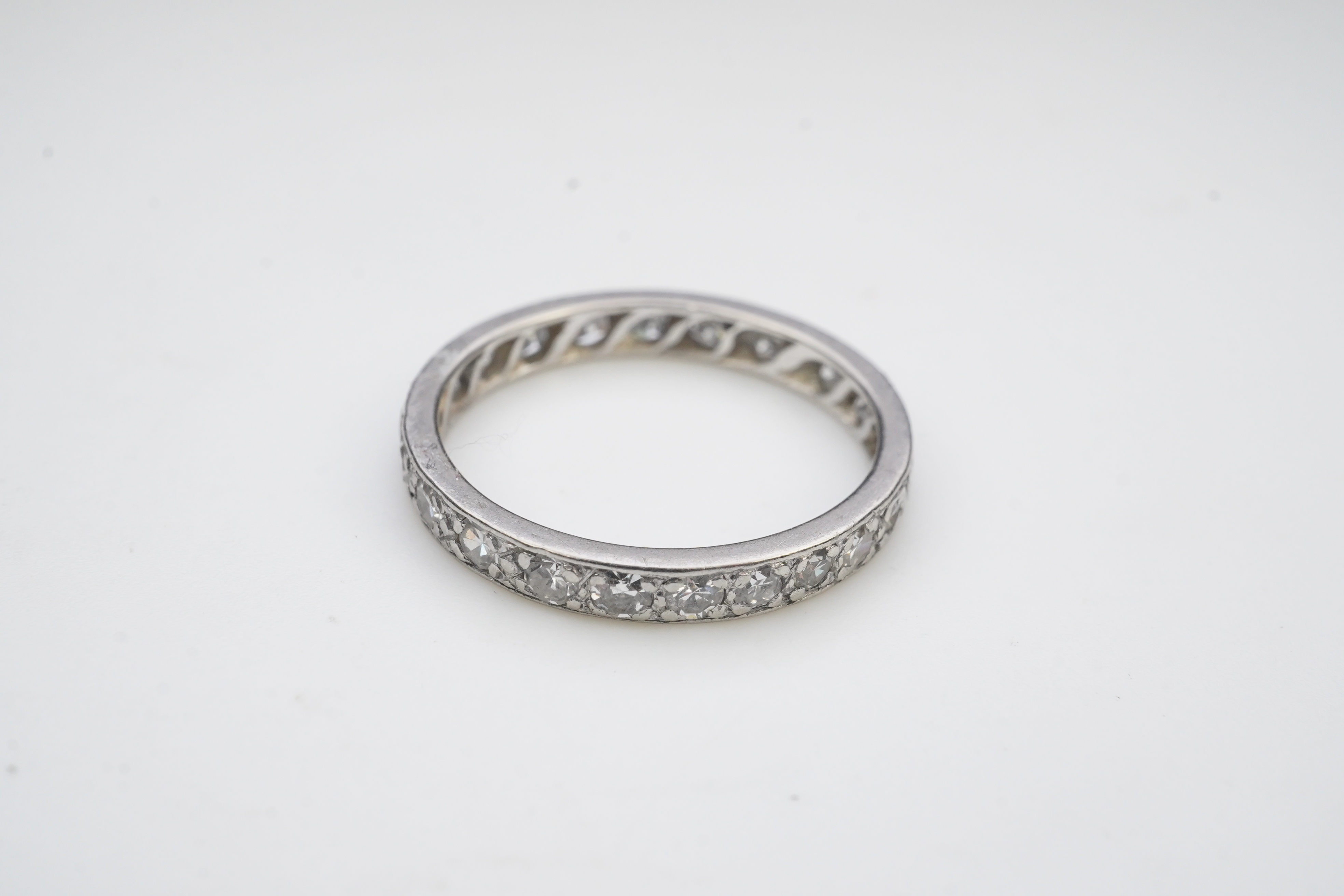 A diamond eternity ring, mid 20th century